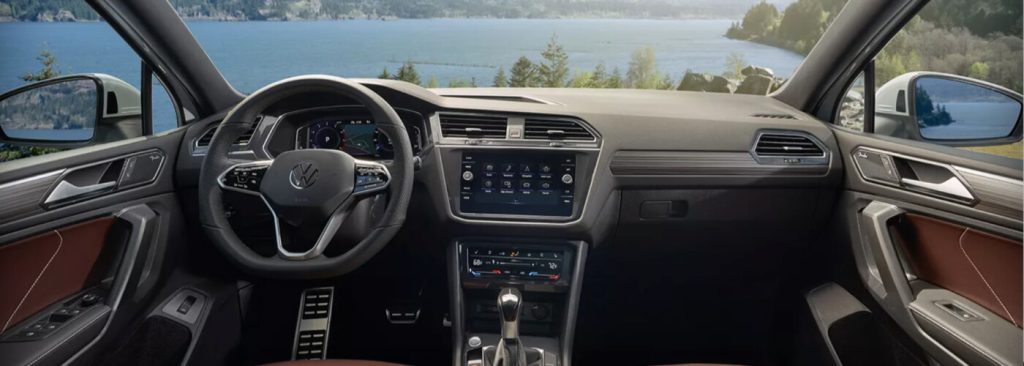 The interior of the new Volkswagen Tiguan is shown, showcasing the impeccable dash and front seats. Find your new VW Tiguan near Greenville at Volkswagen of Spartanburg today!